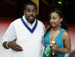 Grammy Award-winning songwriter and producer Rodney “Darkchild” Jerkins surprises Natércia Pintor, the new “Voice of McDonald’s®” with an invitation to record a demo tape in his Los Angeles music studio at Interscope Records.